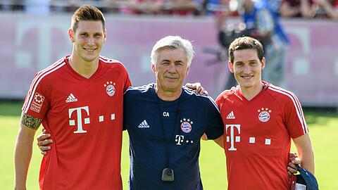 "Sie machen uns konkurrenzfähiger", sagt Ancelotti über die Neuzugänge Süle (l.) und Rudy (r.).