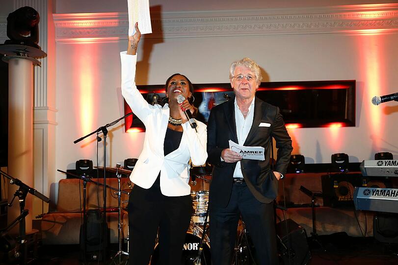Motsi Mabuse und Marcel Reif bei der AMREF Charity Gala "Come fly with us" zugunsten 50 Jahre AMREF FLYING DOCTORS im Rilano No.6 Lenbach Palais in München am 21.03.2014.