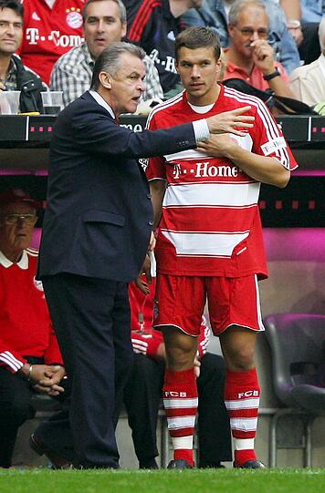 Lukas Podolski (mit Trainer Ottmar Hitzfeld) in der Saison 2007/2008.