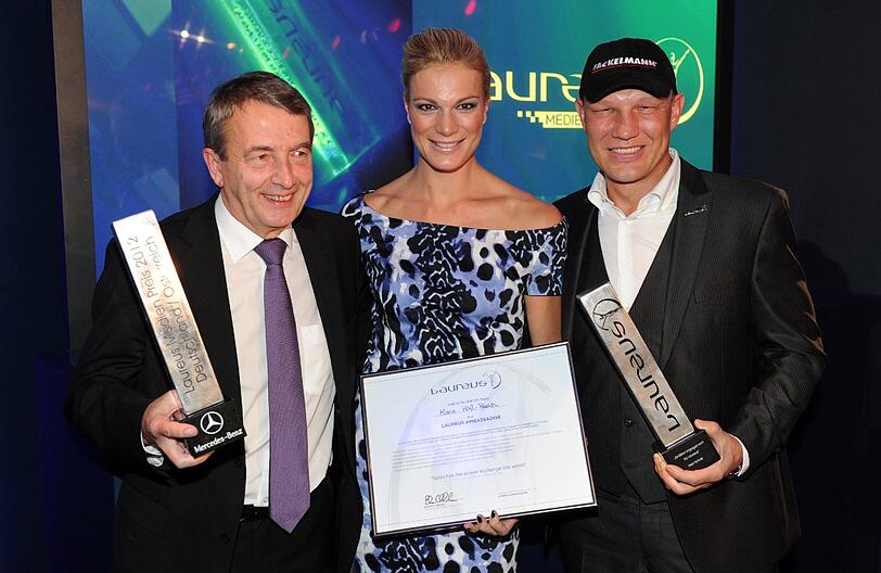 DFB-Präsident Wolfgang Niersbach (l-r), die Skirennläuferin Maria Höfl-Riesch und der frühere Boxprofi Axel Schulz.