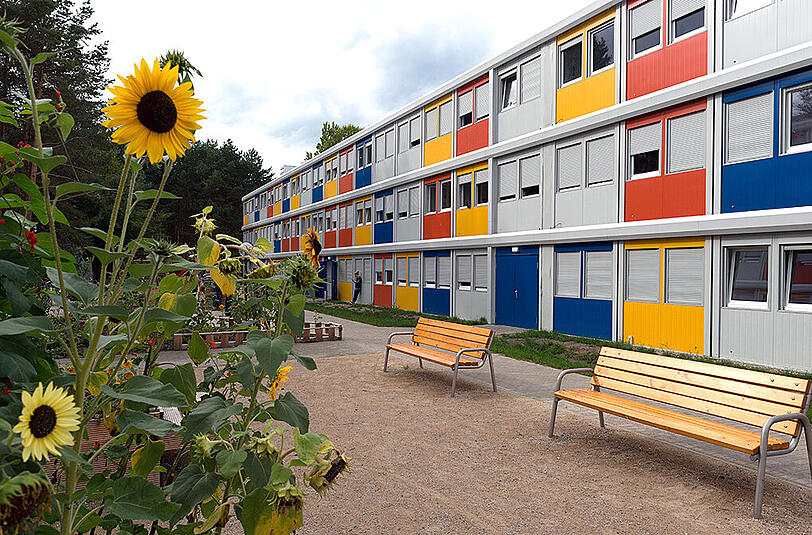 Unter anderem war in Wolfratshausen eine Container-Siedlung geplant. Weil die jetzt nicht kommt, fordert die Stadt Schadenersatz.