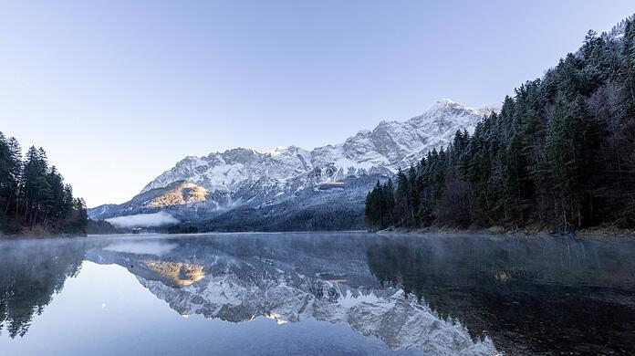 Ärger am Eibsee: Eine österreichische Firma plant einen Windpark direkt an der deutschen Grenze.