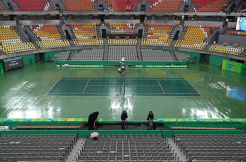Regen in Rio: Das Wetter sorgt für Absagen und Verschiebungen, auch im Tennisturnier.