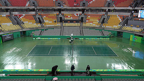 Regen in Rio: Das Wetter sorgt für Absagen und Verschiebungen, auch im Tennisturnier.