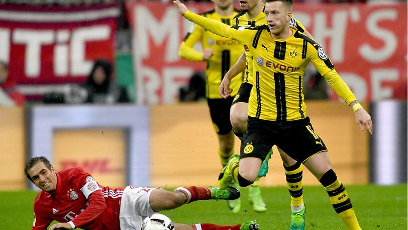 Die Bayern mit Kapitän Philipp Lahm am Boden, der BVB obenauf: Im April diesen Jahres schießen sich die Dortmunder in der Allianz Arena mit einem 3:2-Sieg ins Pokalfinale.