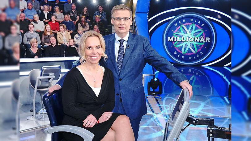 Moderator Günther Jauch mit Anke Wiegand