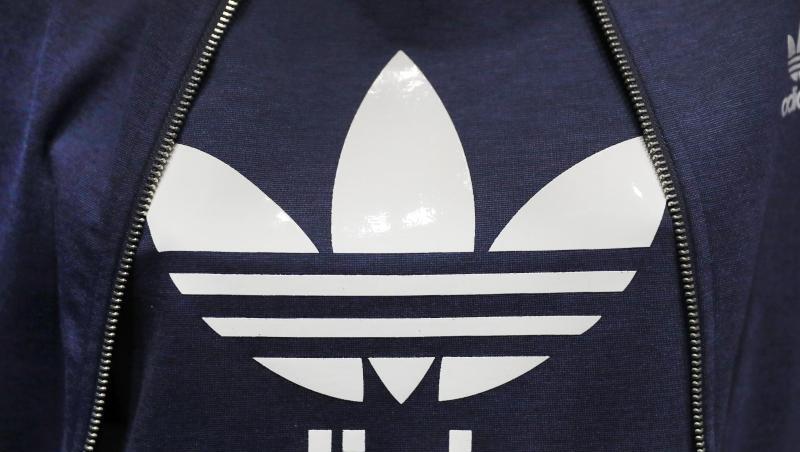 Logo des Sportartikelherstellers Adidas. Foto: Daniel Karmann/Archivbild Logo des Sportartikelherstellers Adidas. Foto: Daniel Karmann/Archivbild