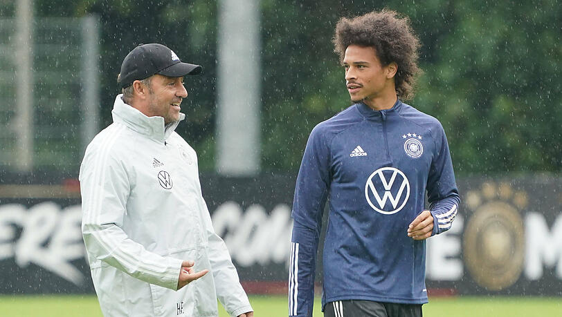 Bundestrainer Hansi Flick und Bayern-Star Leroy Sané.