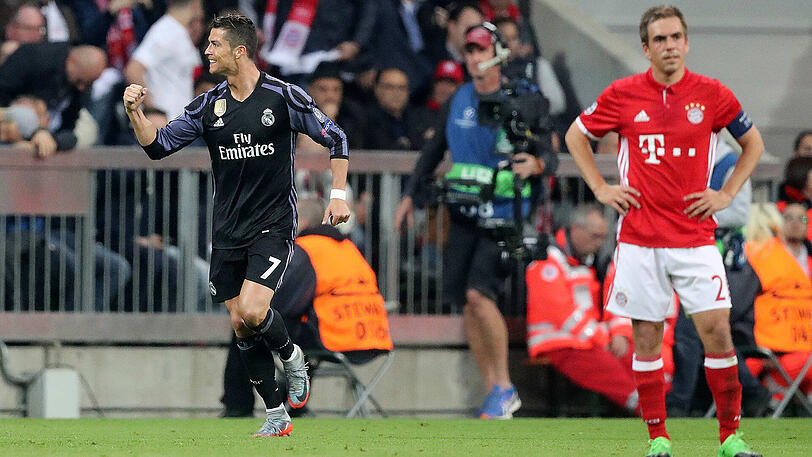 Des einen Freud, des anderen Leid: Ronaldo bejubelt sein Tor zum 2:1, Lahm findet es nicht so toll.