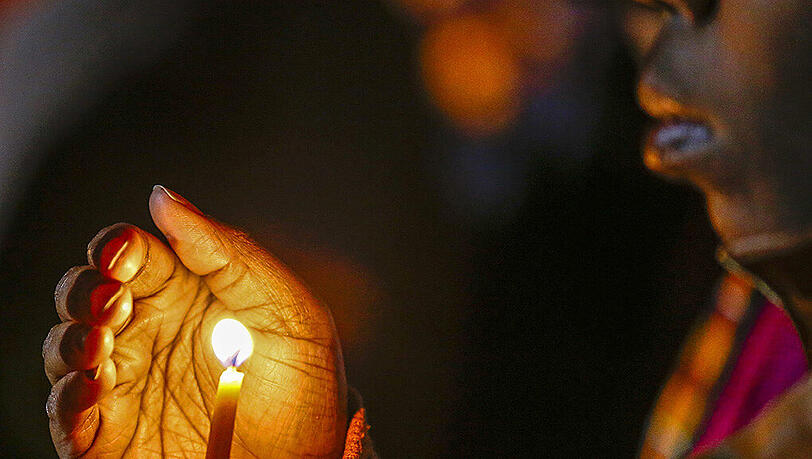 Eine Frau demonstriert in der US-Stadt Ferguson, Missouri, wegen der tödlichen Polizeischüsse auf einen jungen Schwarzen. Eine Frau demonstriert in der US-Stadt Ferguson, Missouri, wegen der tödlichen Polizeischüsse auf einen jungen Schwarzen.