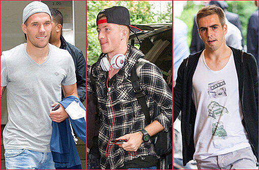 Gestatten: Die Nationalmannschaft vor dem Einchecken im Charles Hotel. Besonders Marco Reus und Lukas Podolski spielen sich dabei kleidungstechnisch in den Vordergrund. Die Bilder