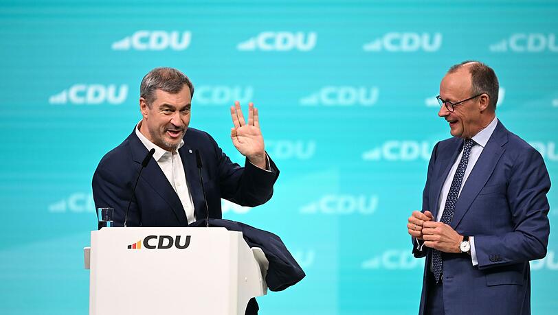 CSU-Chef Söder und Kanzler Merz (r) werden auf dem CSU-Parteitag versuchen, für neues Vertrauen der Unionsanhänger in die Arbeit der Bundesregierung zu werben. (Archivbild) CSU-Chef Söder und Kanzler Merz (r) werden auf dem CSU-Parteitag versuchen, für neues Vertrauen der Unionsanhänger in die Arbeit der Bundesregierung zu werben. (Archivbild)