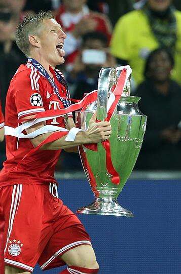 Verstanden sich bestens: Schweinsteiger und der Henkelpokal