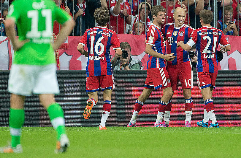 Saison 2014/15: Die Bayern jubeln nach einem Tor gegen den VfL Wolfsburg. Endstand: 2:1 für die Münchner.