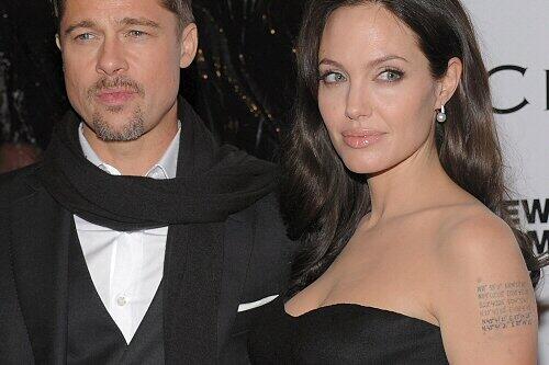 Pitt und Jolie (mit frischen Tattoos)