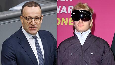 Jens Spahn (l.) wirft Ski Aggu Verleumdung vor.