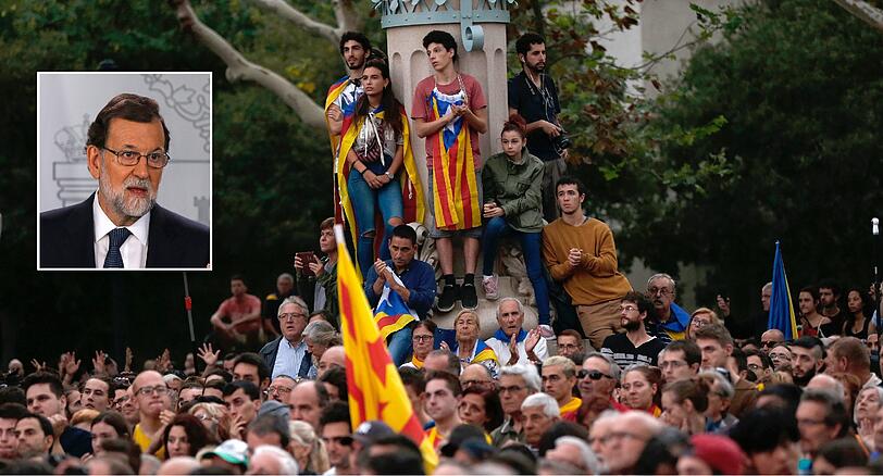 Katalonien strebt die Unabhängigkeit an, Spaniens Regierungschef Rajoy (kleines Bild) lehnt das strikt ab.