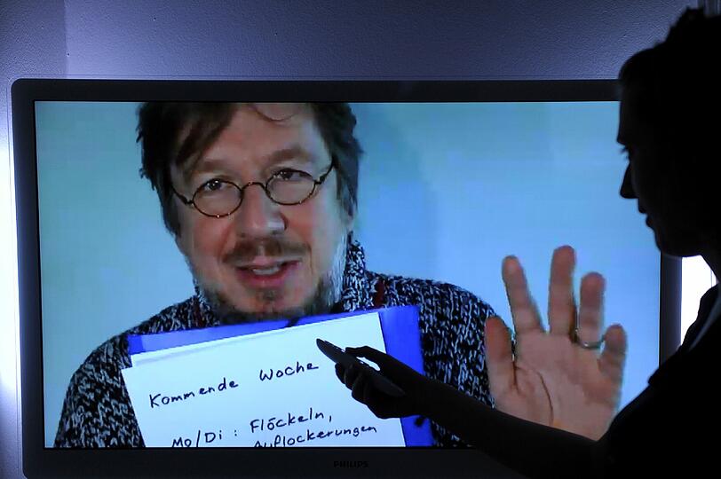 Jörg Kachelmann als Wetterfrosch eines fränkischen Senders.