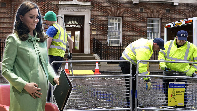 Vorbereitungen vor dem St. Mary's Hospital in London: Arbeiter errichten Absperrgitter. Vorbereitungen vor dem St. Mary's Hospital in London: Arbeiter errichten Absperrgitter.