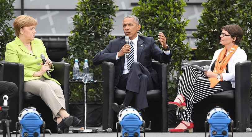 Bei Merkel und Obama: Ausgelassene Stimmung beim Kirchentag in Berlin