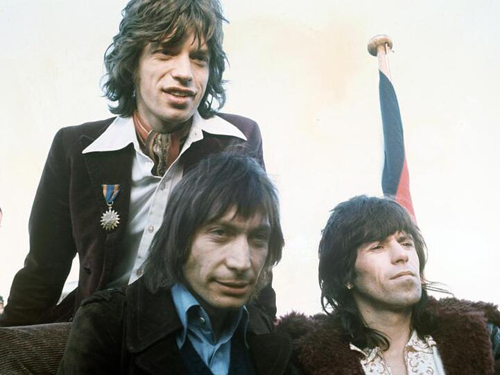 Wilde Jungs: Mick Jagger (l-r), Charlie Watts und Keith Richards 1970 bei einer Pressekonferenz.