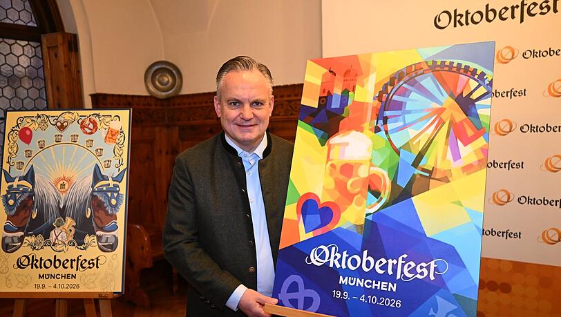 Wiesnchef Christian Scharpf pr&auml;sentiert das offizielle Motiv zum Oktoberfest 2026.