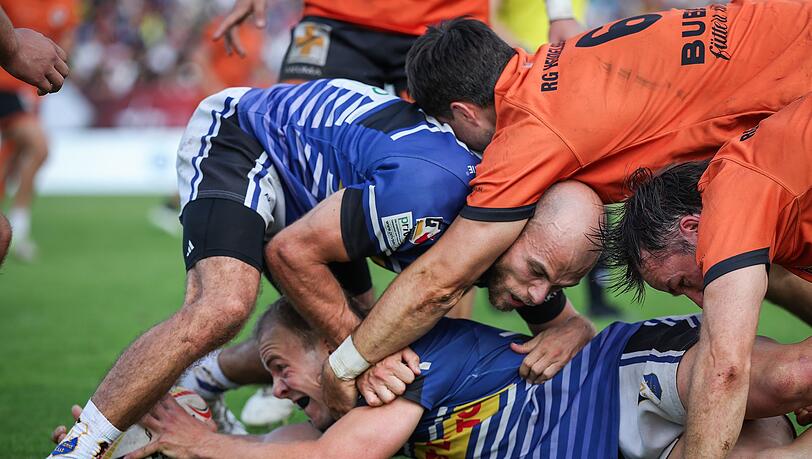 Da geht's drunter und drüber! Bei den "Finals" wird auch die Meisterschaft im 7er-Rugby ausgespielt. Im Bild: Spieler von SC Germania List und RG Heidelberg bei den "Finals" 2025 in Dresden. Da geht's drunter und drüber! Bei den "Finals" wird auch die Meisterschaft im 7er-Rugby ausgespielt. Im Bild: Spieler von SC Germania List und RG Heidelberg bei den "Finals" 2025 in Dresden.