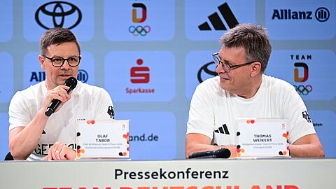DOSB-Chef Thomas Weikert (r) und Chef de Mission Olaf Tabor hoffen auf viele Medaillen in Paris.