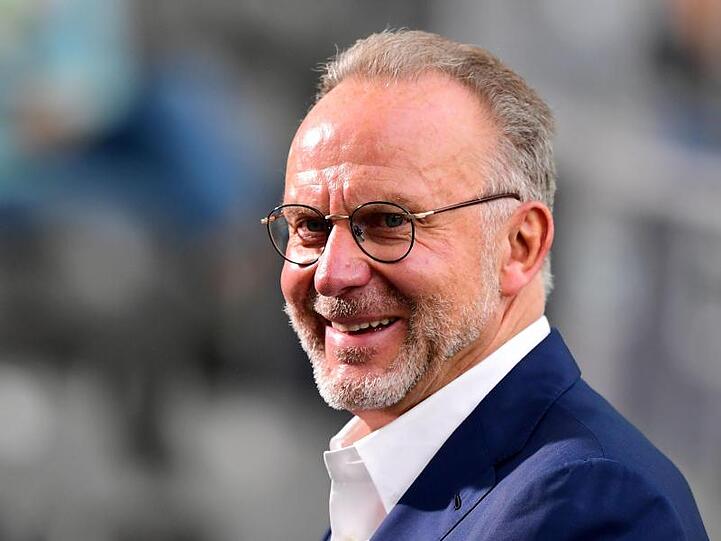 Karl-Heinz Rummenigge, Vorstandsvorsitzender der FC Bayern München AG, lacht. Foto: Robert Michael/dpa-Zentralbild/Pool/dpa
