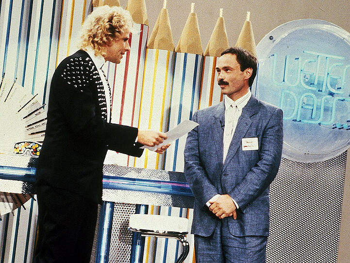 Wetten, dass Thomas Rautenberg (alias "Titanic"- Redakteur Bernd Fritz) Buntstifte am Geschmack erkennen kann? Jürgen Prochnow tippt: Ja; Ausgang: Nein