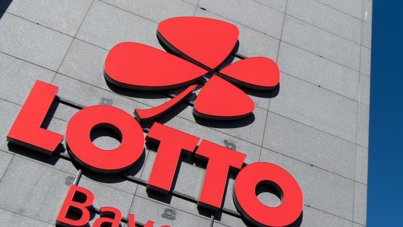Das Logo und der Schriftzug von "Lotto Bayern" sind an dem Firmengebäude der Lottozentrale zu sehen. Foto: Sven Hoppe/Archivbild Das Logo und der Schriftzug von "Lotto Bayern" sind an dem Firmengebäude der Lottozentrale zu sehen. Foto: Sven Hoppe/Archivbild