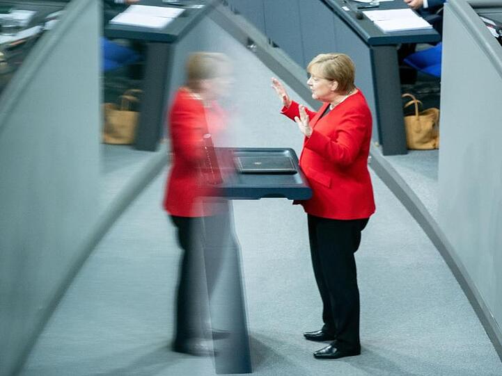 Angela Merkel: "Wer, wenn nicht wir, soll denn zeigen, dass es geht, dass man dem Klimawandel etwas entgegensetzen kann.".