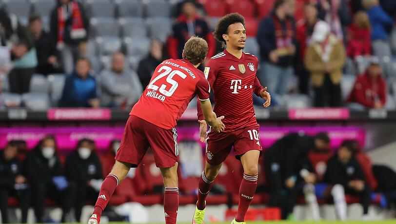 Aufmunterung von Müller (l.):Leroy Sané.