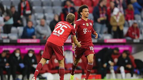 Aufmunterung von Müller (l.):Leroy Sané.