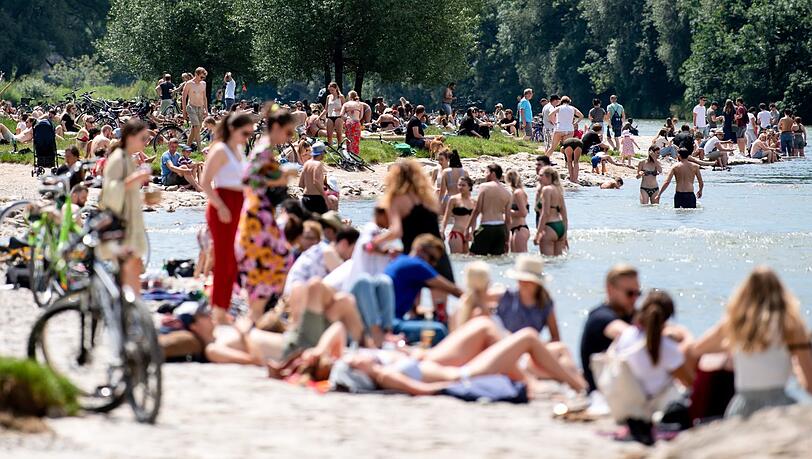 Unter Beobachtung: Menschen-Ansammlungen wie hier an der Isar oder auch am Gärtnerplatz.