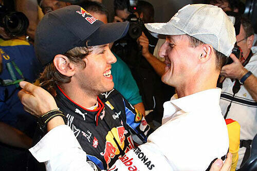 Auf Augenhöhe: Sebastian Vettel (l.) und Michael Schumacher