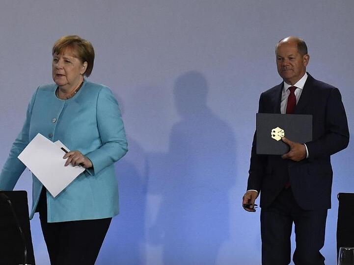 Kanzlerin Angela Merkel (CDU) und Finanzminister Olaf Scholz (SPD).
