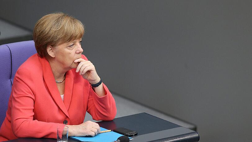 Kanzlerin Angela Merkel will Deutschlands Grenzen weiterhin offen halten. Das stößt bei vielen Unions-Abgeordneten auf Unverständnis. Kanzlerin Angela Merkel will Deutschlands Grenzen weiterhin offen halten. Das stößt bei vielen Unions-Abgeordneten auf Unverständnis.