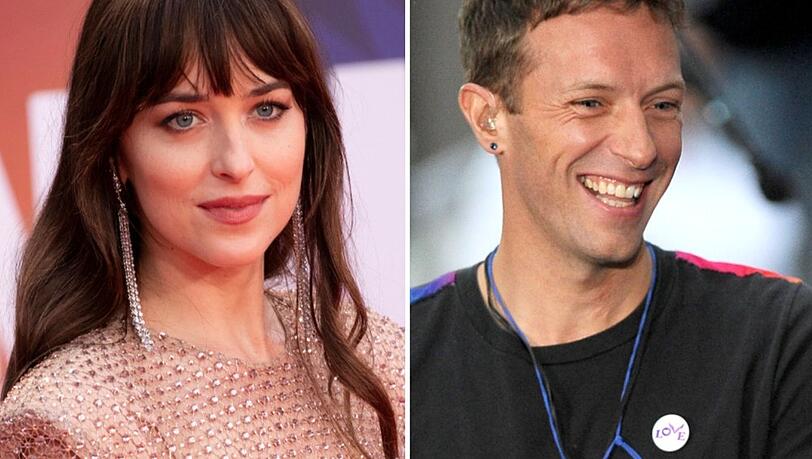 Dakota Johnson neben ihrem Partner Chris Martin.