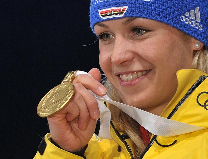 Gold, Silber, Bronze: Magdalena Neuner und ihr Medaillensatz in Ruhpolding.