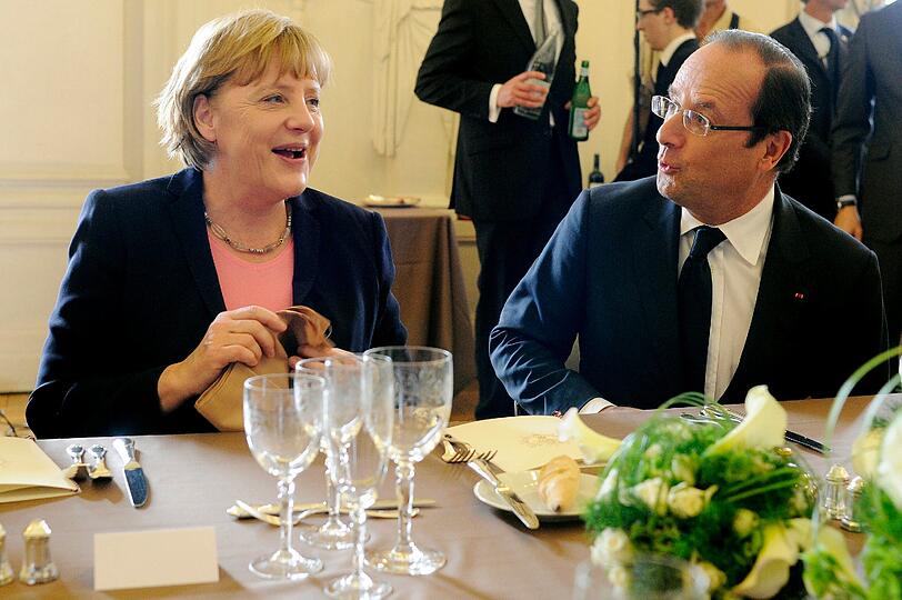 Merkel und Hollande feiern in Reims deutsch-französische Freundschaft. Die Bilder