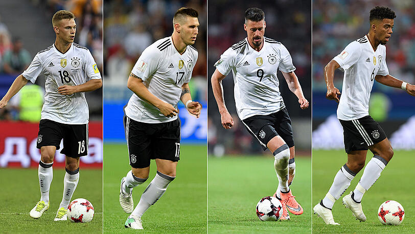 Wer darf mit zur WM 2018 in Russland? Die deutschen Nationalspieler Joshua Kimmich ("sicherer WM-Fahrer"), Niklas Süle ("in WM-Form"), Sandro Wagner ("Wackelkandidat") und Benjamin Henrichs ("Außenseiter-Chancen" - von links). Wer darf mit zur WM 2018 in Russland? Die deutschen Nationalspieler Joshua Kimmich ("sicherer WM-Fahrer"), Niklas Süle ("in WM-Form"), Sandro Wagner ("Wackelkandidat") und Benjamin Henrichs ("Außenseiter-Chancen" - von links).