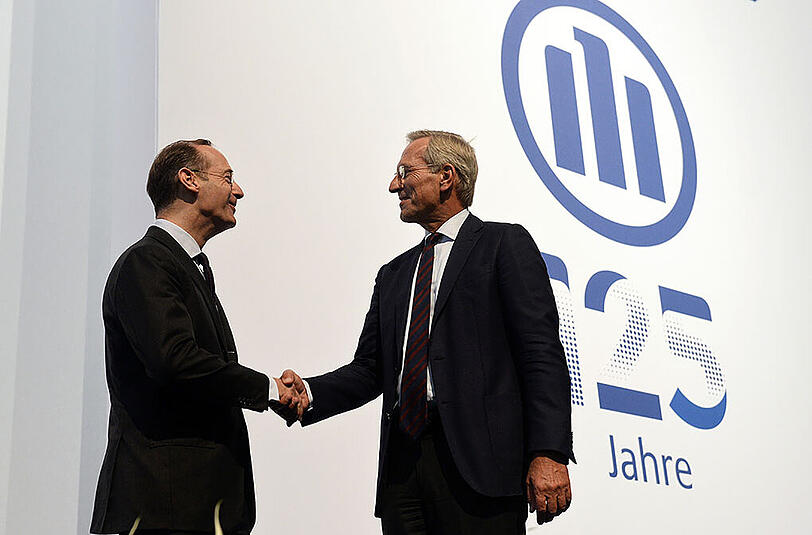 Der ehemalige Vorstandsvorsitzende Michael Diekmann und der amtierende Vorsitzende Oliver Bäte bei der Hauptversammlung der Allianz-Group.
