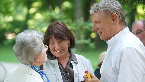 Dieter Reiter mit seiner Ehefrau beim Straßen-Wahlkampf in München.