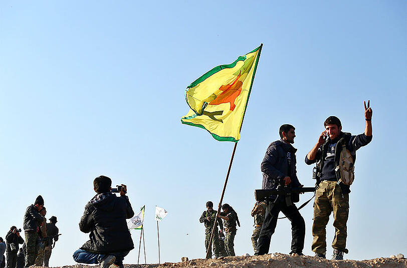 Kurdische Kämpfer nach ihrem Sieg über die Terrormiliz IS in Kobane.