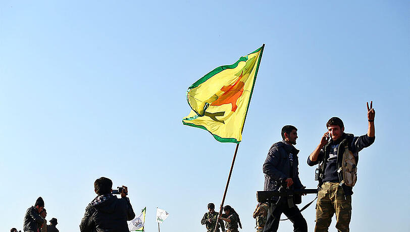 Kurdische Kämpfer nach ihrem Sieg über die Terrormiliz IS in Kobane. Kurdische Kämpfer nach ihrem Sieg über die Terrormiliz IS in Kobane.
