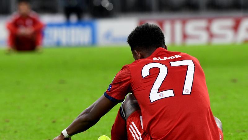 Münchens David Alaba sitzt nach der 1:3-Niederlage auf dem Rasen und schnürt sich die Schuhe. Foto: Peter Kneffel/Archiv Münchens David Alaba sitzt nach der 1:3-Niederlage auf dem Rasen und schnürt sich die Schuhe. Foto: Peter Kneffel/Archiv