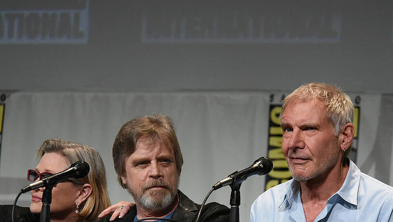 Ganz der Alte: Harrison Ford (r.) zusammen mit Carrie Fisher und Mark Hamill bei der San Diego Comic-Con Ganz der Alte: Harrison Ford (r.) zusammen mit Carrie Fisher und Mark Hamill bei der San Diego Comic-Con