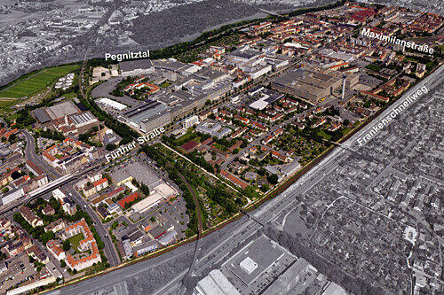 Das Stadterneuerungsgebiet im Nürnberger Westen: Links und rechts der Fürther Straße sind das AEG-Gelände und das Quelle-Zentrum zu sehen.