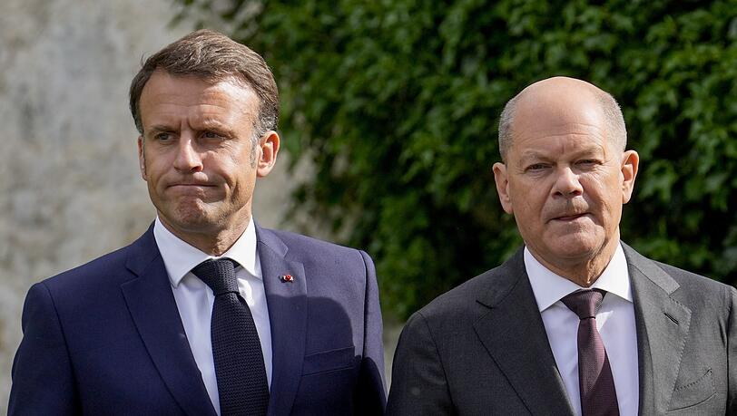 Zwei, die ähnliche Probleme haben, aber unterschiedliche Lösungen suchen: Macron und Scholz.